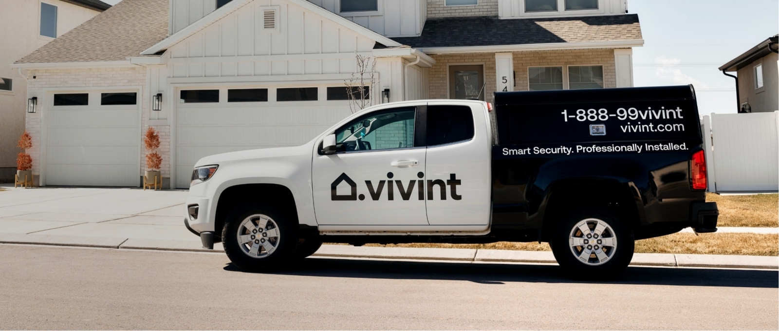 Vivint truck parked in front of a house