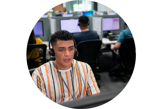 A Vivint customer service agent with headphone at a call center