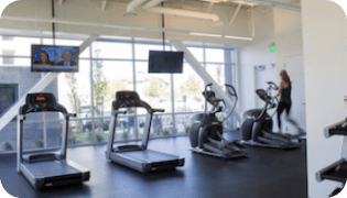 Multiple treadmills in Vivint's exercise room