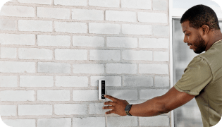 Man ringing a Vivint Doorbell Camera Pro
