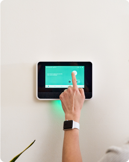 Person touching their Smart Hub with watch on