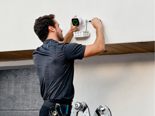 Vivint Smart Home Pro installing an Outdoor Camera + Spotlight Pro