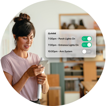 Woman holding phone with image of app options