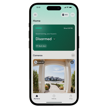 Vivint app on a phone showing "your house is disarmed", with a view through Vivint doorbell camera
