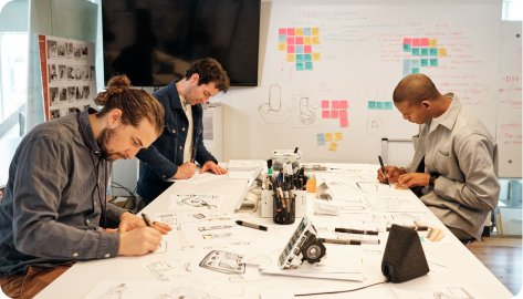 Group of Vivint employees working together at a table