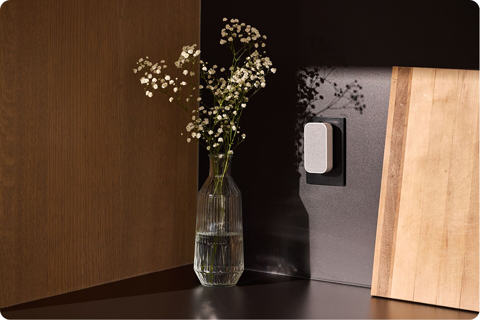 Vivint chime extender plugged in on a wall