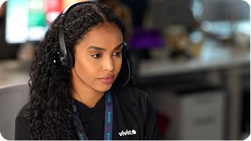 a Vivint representative talking to a customer in the call center