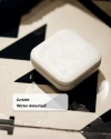 Vivint water sensor on the floor next to a notification saying "Water detected!"