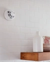 Smoke & CO Combo Detector mounted on a kitchen wall