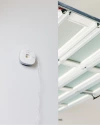 Vivint garage door control installed on the wall next to a garage
