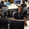 vivint employee with headset on monitoring system