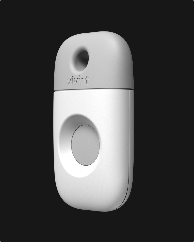 Vivint emergency pendant on a black background