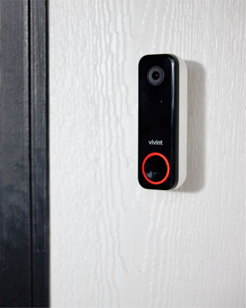 Vivint's Doorbell Camera Pro mounted beside a front door
