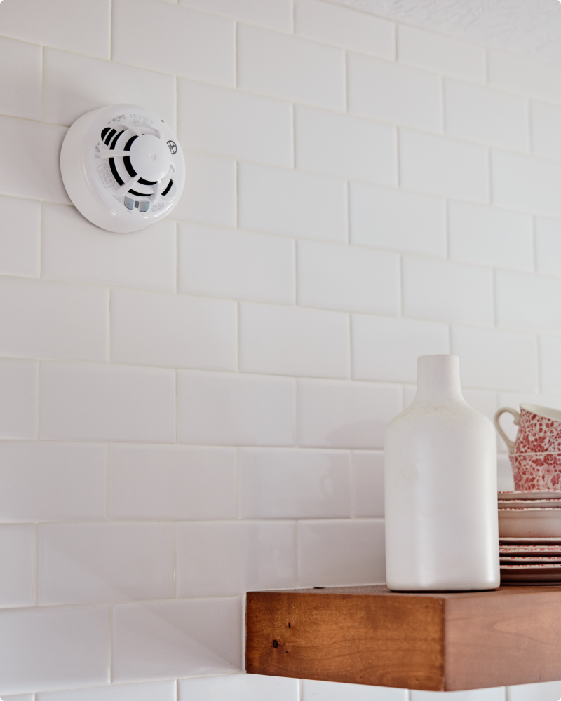 Vivint smoke detector on the kitchen wall