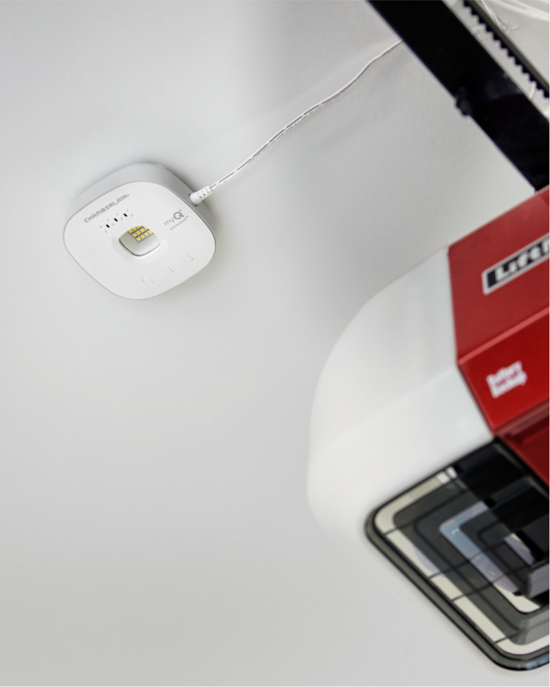 Vivint garage door control connected to a garage door