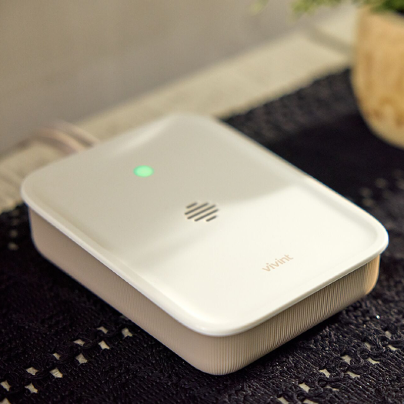 Vivint Security Hub lying on a shelf