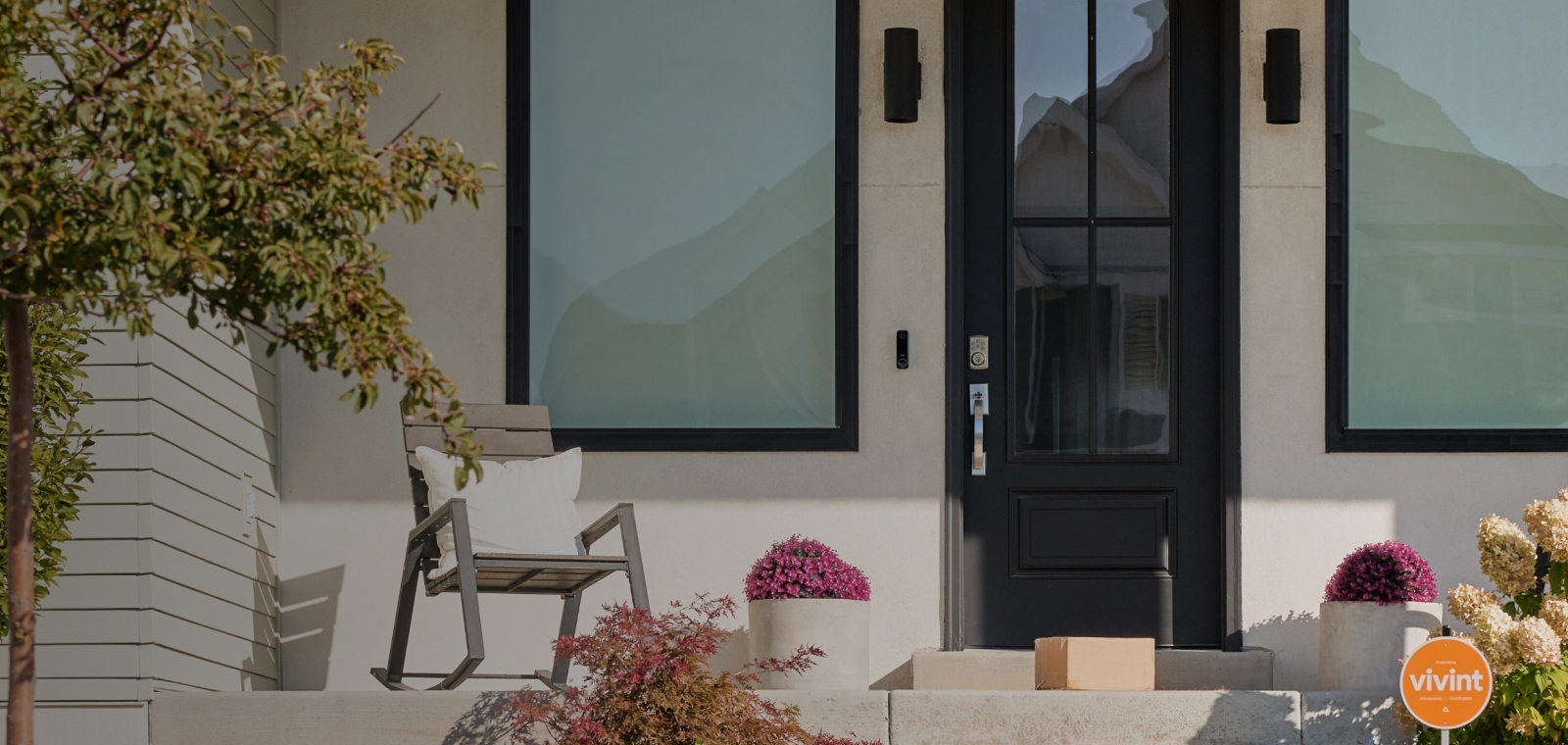View of packages on front porch by door