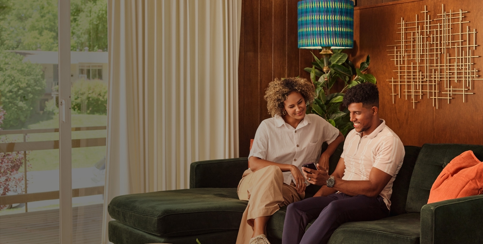 Man and woman in their living room