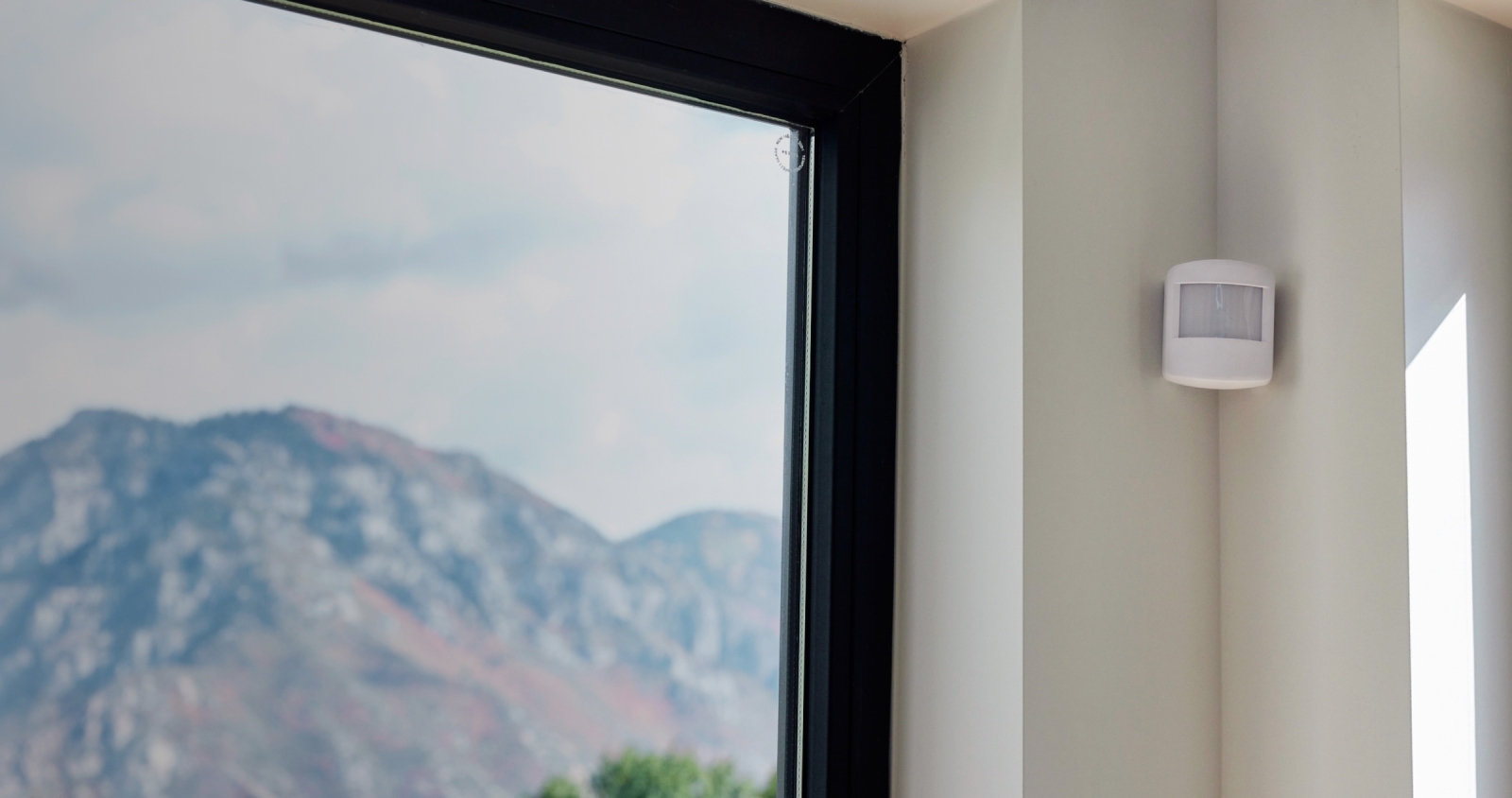 Vivint Motion Sensor Installed and view of mountains outside window