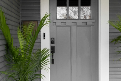 Front door with a Vivint doorbell camera.