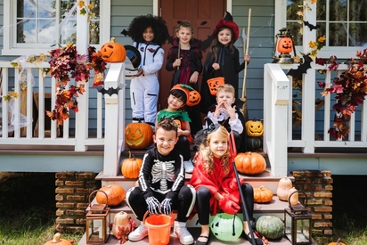 Kids dressed in their Halloween costumes.