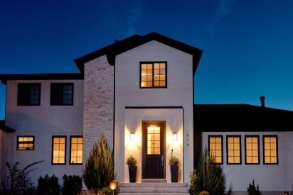Home lit up at night.