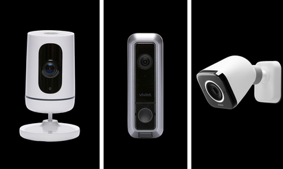 Lineup of old Vivint security cameras.