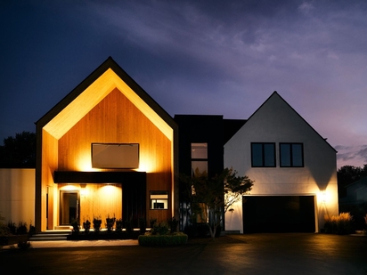 Home's exterior at night.