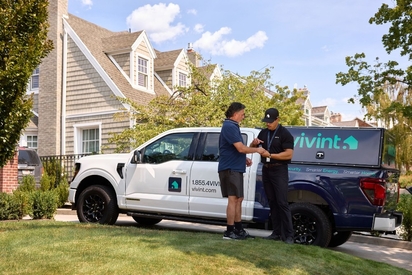 Vivint Smart Home Pro in front of a Vivint truck.