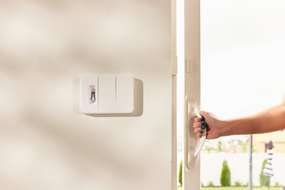 Vivint Door and Window Sensor on a home's sliding glass door.