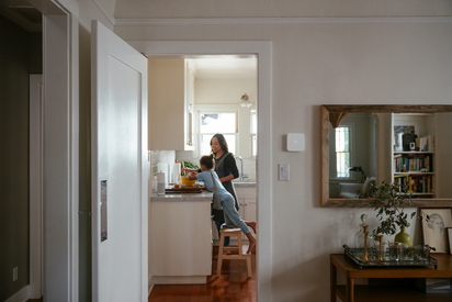 Mother and daughter in the kitchen.