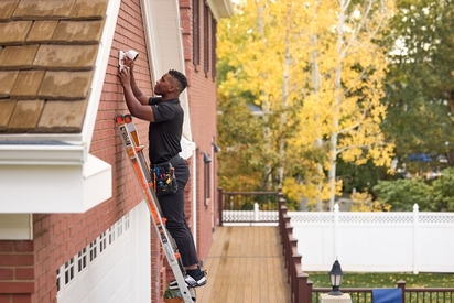 Vivint Smart Home Pro installing a security system.