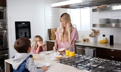 Woman cooking in her kitchen.