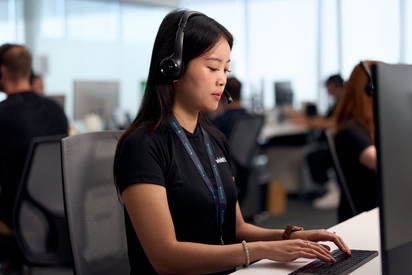 Vivint monitoring professional taking a call