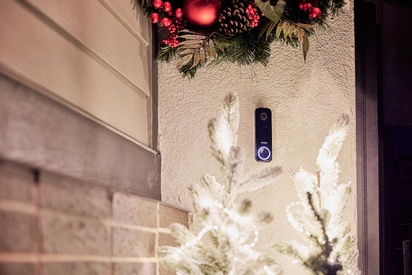 Vivint Doorbell Camera Pro and holiday decorations.