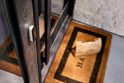 Food delivery left on a front porch.