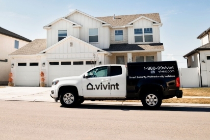 Vivint truck parked in front of a home.