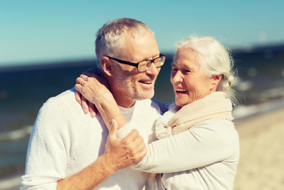 Senior couple at the beach.