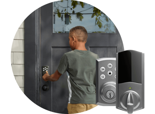 Child entering code on his front door’s smart lock.