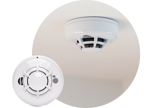 Smoke detector installed on ceiling and product image in bottom right corner