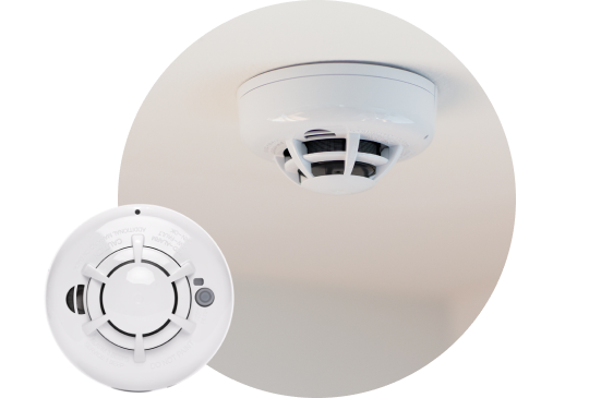 Smoke detector installed on ceiling and product image in bottom right corner