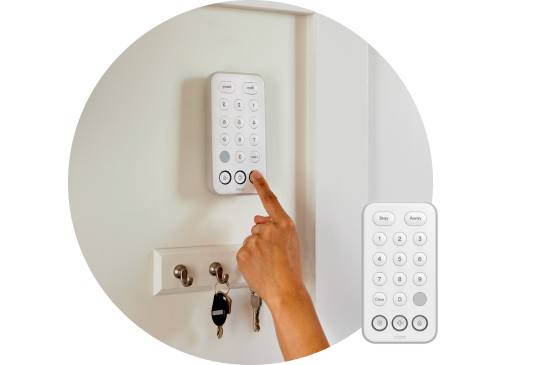 Vivint Keypad on the wall above a key holder