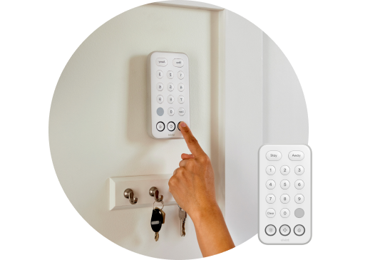 Vivint Keypad on the wall above a key holder