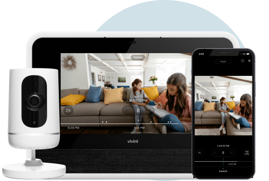 Vivint indoor camera showing a playback on smart hub and a phone