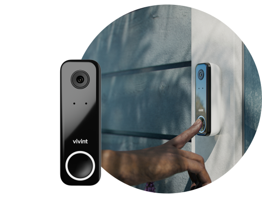 A hand presses a Vivint doorbell camera mounted on a home's front porch.