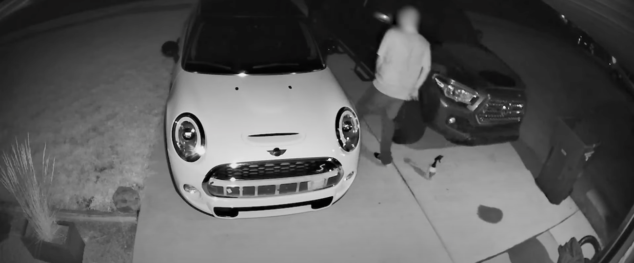 Burglar deterred from car theft by a Vivint camera