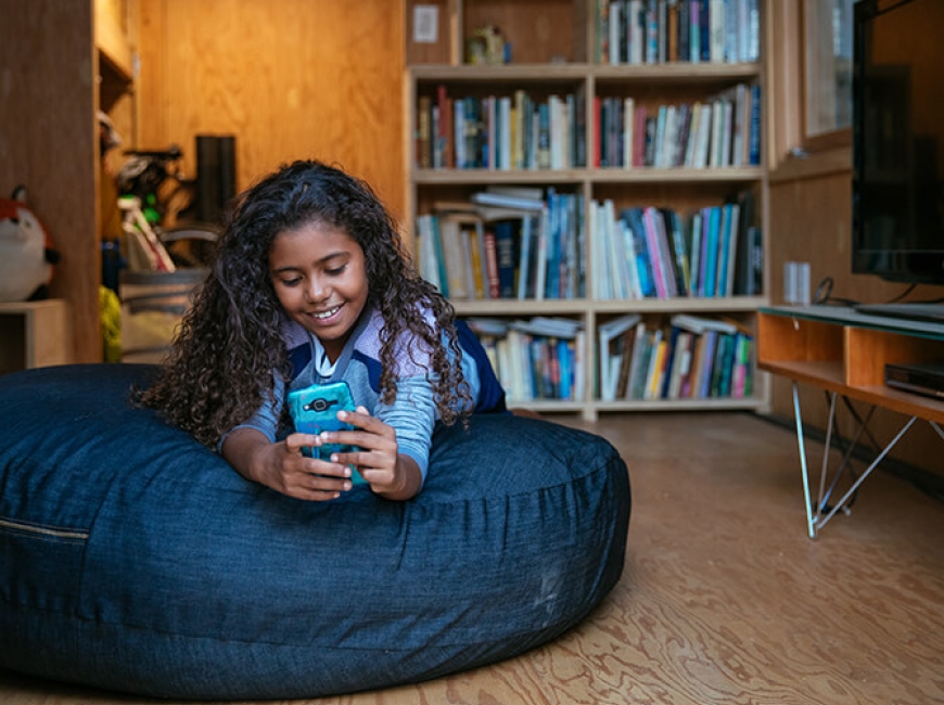 App - Girl on Beanbag - 670x540