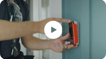 Professional installer installing the Vivint Doorbell Camera Pro